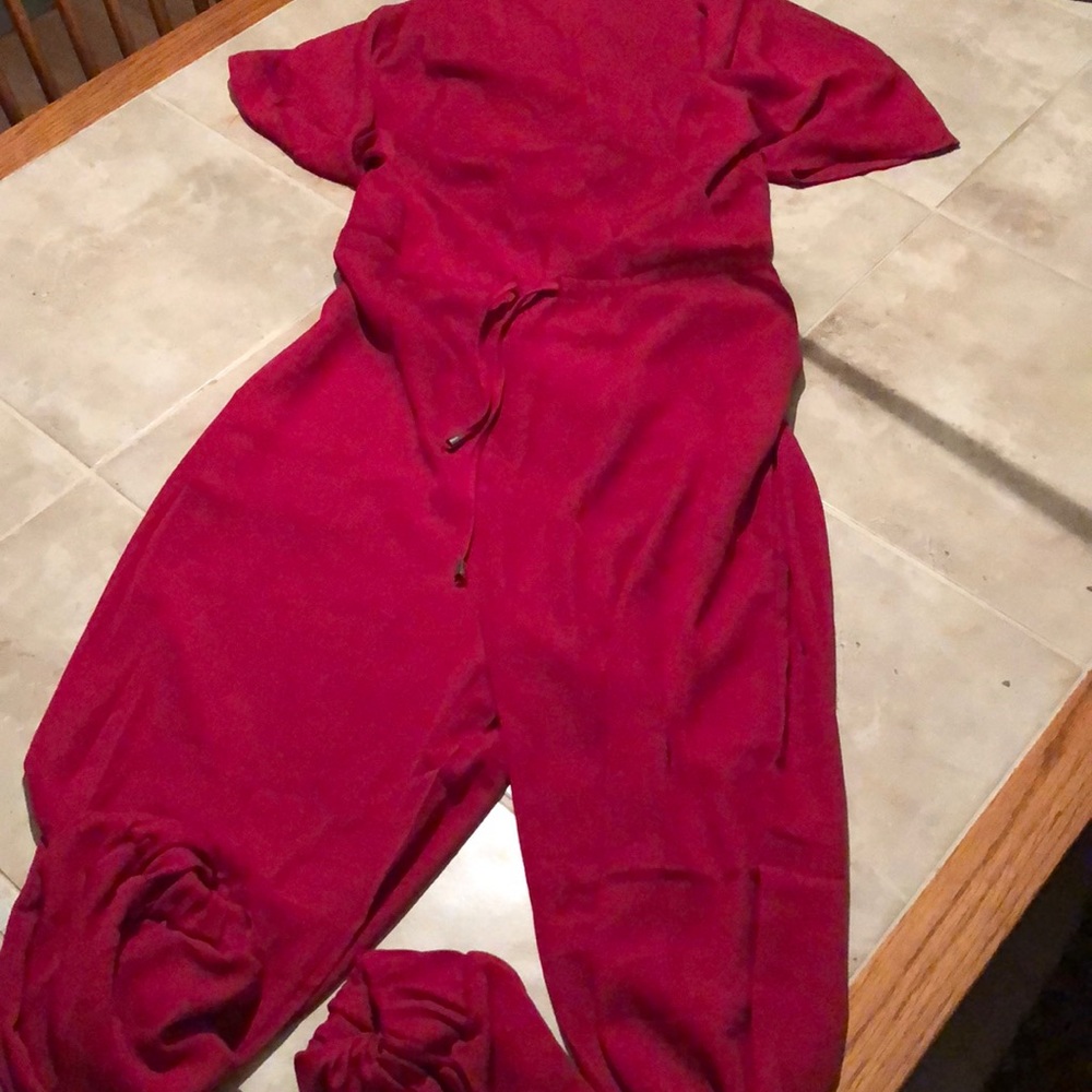 Red jumpsuit brand new without tags